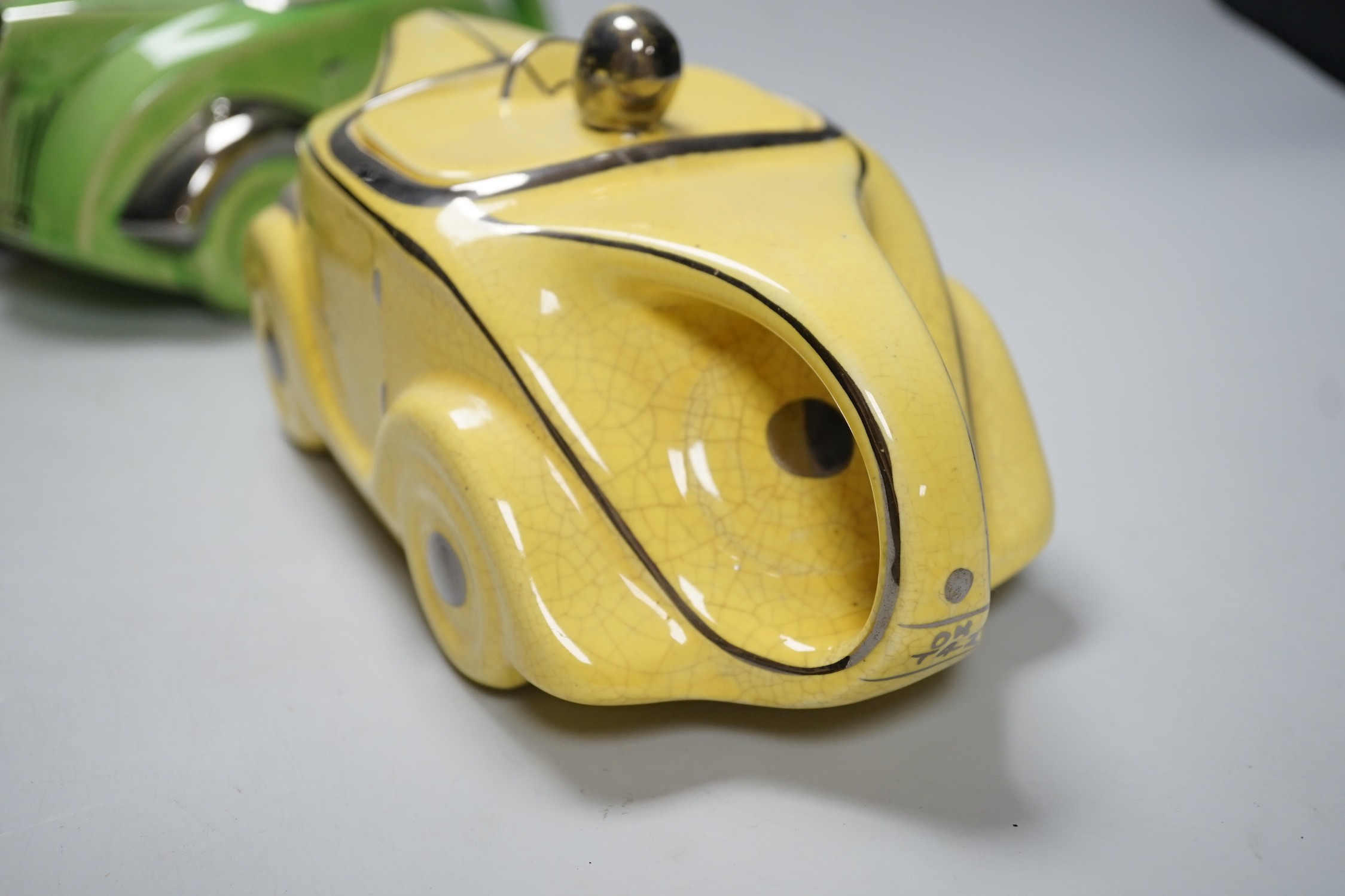 Three 1930s Art Deco Sadler racing car teapots, 22cm long